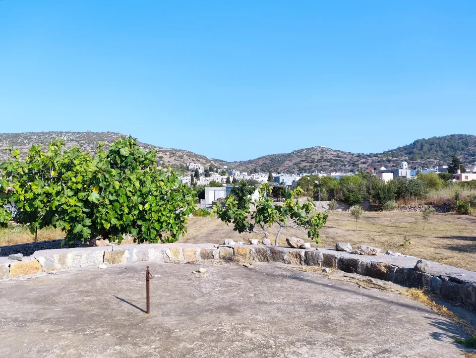 Mesta seen across its surrounding cultivated landscape